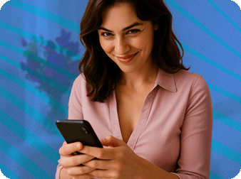 Woman smiling while holding her phone
