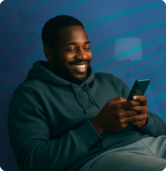 Woman smiling while holding her phone