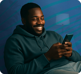 Woman smiling while holding her phone