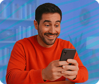 Woman smiling while holding her phone