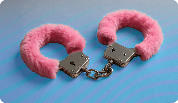Furry pink handcuffs