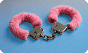 Furry pink handcuffs