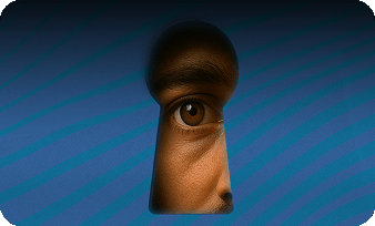 Man looking through oversized keyhole